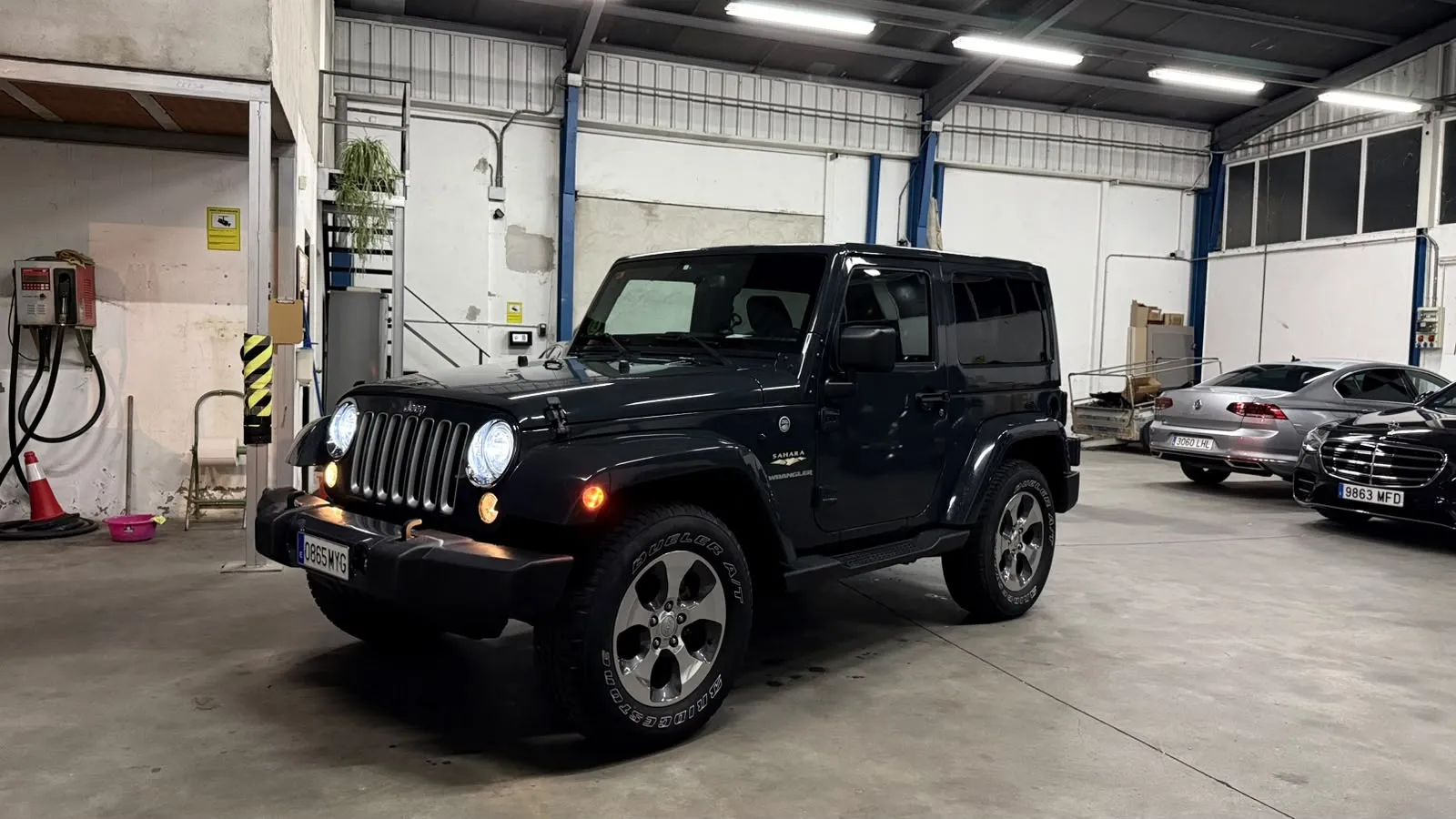 Jeep Wrangler Sahara rear three-quarter view